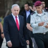 Israeli Prime Minister Benjamin Netanyahu speaks with Israel Defense Forces Chief of Staff Lt. Gen. Aviv Kochavi during an event honoring outstanding IDF reservists at the President's Residence in Jerusalem on July 1, 2019. Photo by Hadas Parush/Flash90.
