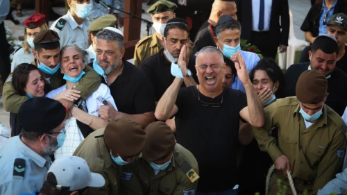 Mourners at the funeral of IDF Staff Sgt. Amit Ben-Yigal, who was hit on the head by a rock by Palestinian attackers and died of his wounds, May 12, 2020. Photo by Yossi Aloni/Flash90.