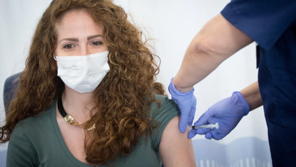 An Israeli nurse during a simulated vaccination against the COVID-19 virus at the Sheba Medical Center. Israel is to being its vaccination campaign on Dec. 27, 2020. Photo by Miriam Alster/Flash90.