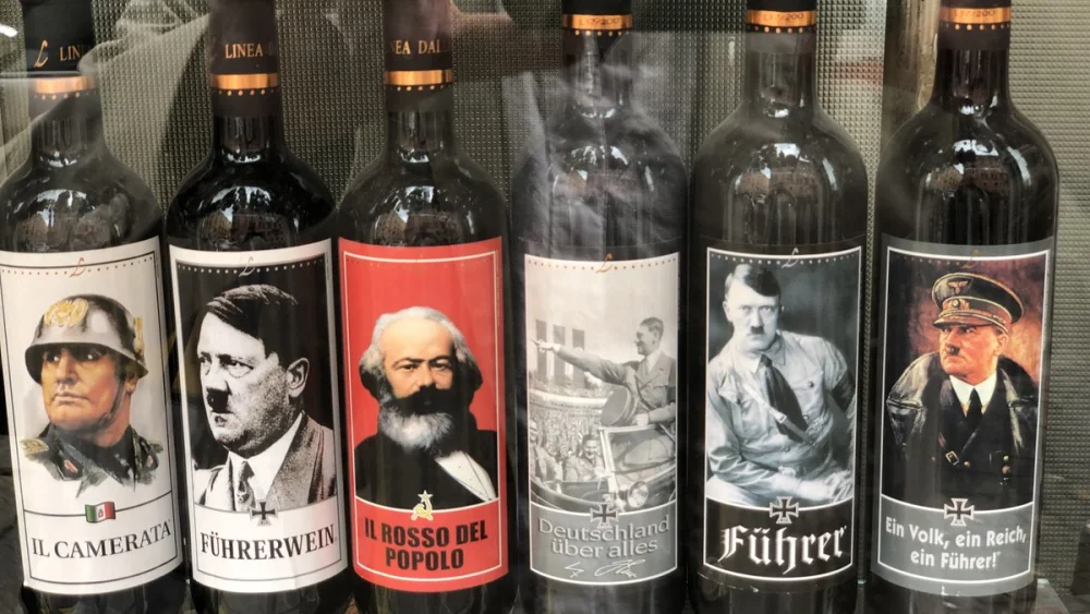 Italian winemaker Vina Lunardelli's controversial wine bottles, part of a “Historical Series,” features pictures of Hitler, Nazi slogans and pictures of notorious SS members, such as Heinrich Himmler. Source: Twitter.