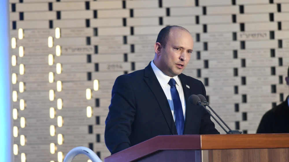 Israeli Prime Minister Naftali Bennett delivers an address at a memorial ceremony at Mount Herzl in Jerusalem for the IDF soldiers who fell in 2014's "Operation Protective Edge," June 20, 2021. Photo by Amos Ben-Gershom/GPO.