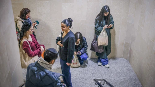Israelis take cover at Yitzhak Navon train station in Jerusalem as a siren sounds warning of incoming ballistic missiles fired from Iran toward Israel, March 1, 2026. Photo by Rachel Alroey/Flash90.