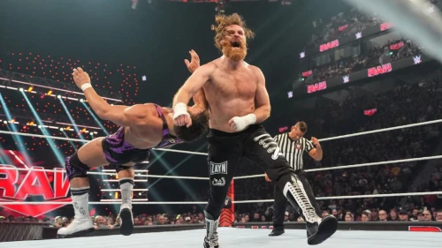 Canadian wrestler Sami Zayn clotheslines Chad Gable during Monday Night RAW at the Bell Centre in Montreal on April 15, 2024. Photo by WWE via Getty Images.
