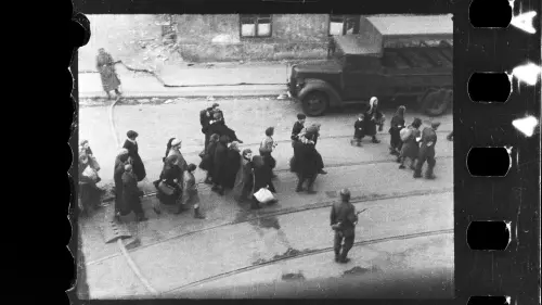 Jews in the process of being deported from the Warsaw Ghetto following the revolt of April-May 1943. From the family archives of Maciej Grzywaczewski, son of Leszek Grzywaczewski. Photo by Zbigniew Leszek Grzywaczewski. Credit: POLIN Museum.
