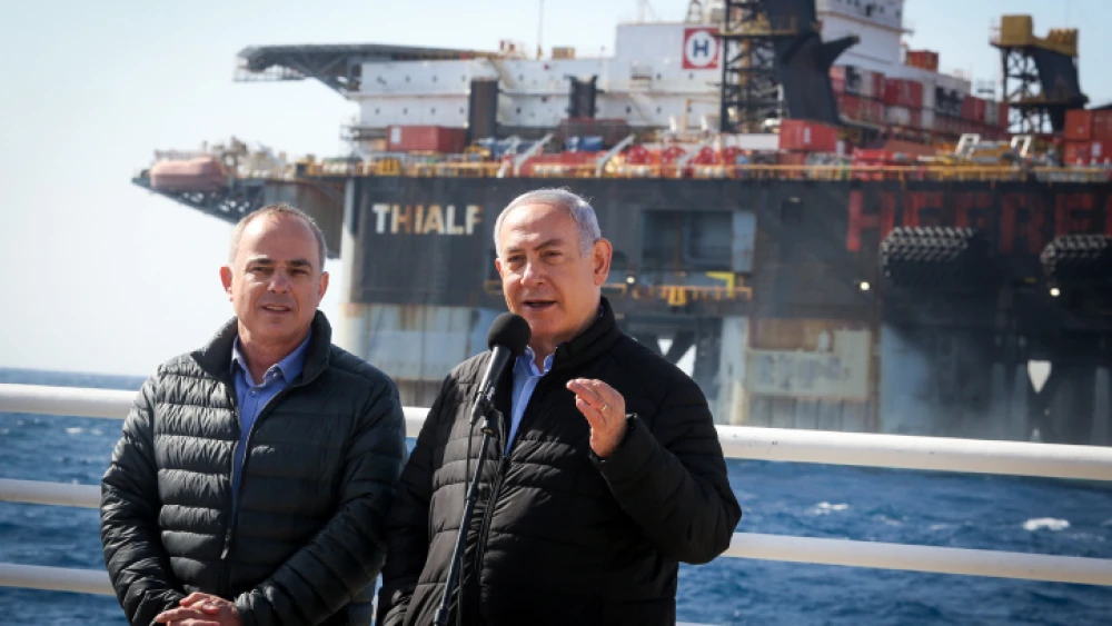 Israeli Prime Minister Benjamin Netanyahu and Israeli Energy Minister Yuval Steinitz visit a gas processing rig at Israel's Leviathan gas field, on Jan. 31, 2019. Photo by Marc Israel Sellem/POOL.