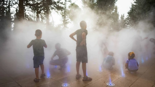 Children play in a water fountain on a hot summer day in Jerusalem, Aug. 12, 2025. Photo by Chaim Goldberg/Flash90.