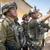 IDF Chief of Staff Lt. Gen. Eyal Zamir, left, listens as a commander points out positions during an operational assessment in the Gaza Strip, Aug. 5, 2026. Credit: IDF.