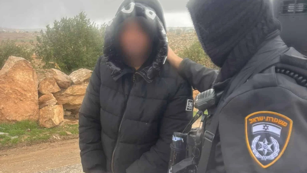 Israel Police officers arrest an armed suspect accused of impersonating Israel Defense Forces soldiers, Jan. 13, 2025. Credit: Israel Police Spokesperson's Unit.