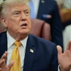 U.S. President Donald Trump speaks to the media after signing an executive order establishing the President's Military Spouse Commission in the Oval Office at the White House on Aug. 3, 2026 in Washington, DC. Photo by Chip Somodevilla/Getty Images.