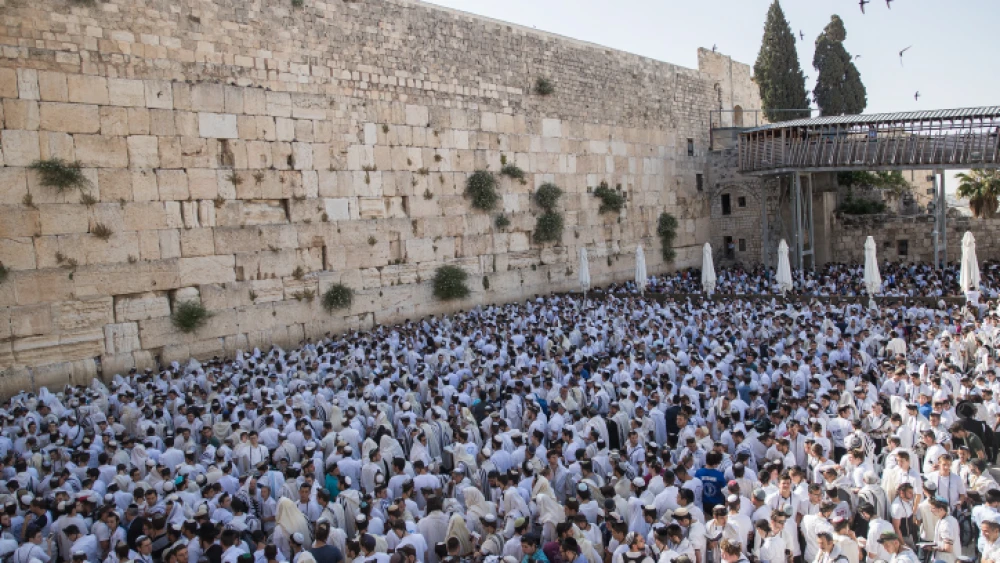 Jewish men pray at the Western Wall in Jerusalem Old City during Yom Yerushalayim (Jerusalem Day), June 2, 2019. Photo by Yonatan Sindel/Flash90.