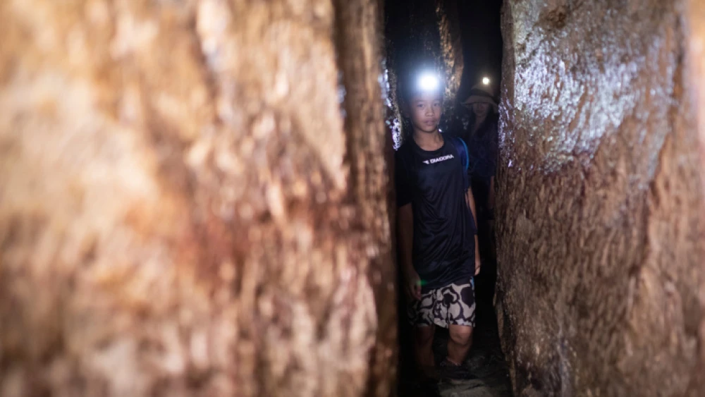 Hezekiah's Tunnel, an underground water canal that leads to the Siloam Pool in the City of David National Park on July 28, 2019. Photo by Hadas Parush/Flash90.