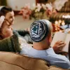 A man wearing a kippah sitting with his family. Credit: RDNE Stock project/Pexels.