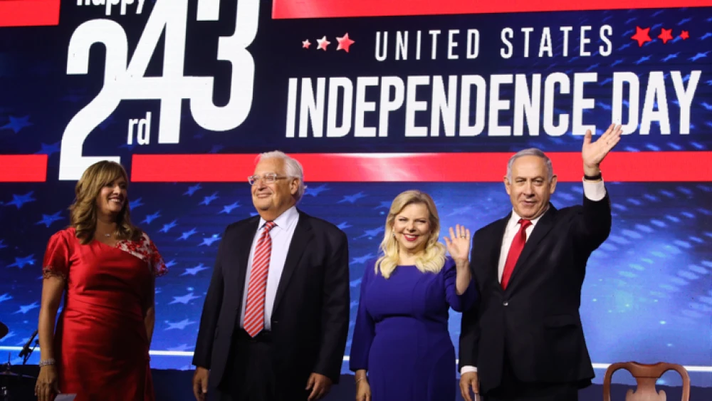 Israeli Prime Minister Benjamin Netanyahu and his wife, Sara, stand next to U.S. Ambassador to Israel David Friedman and his wife, Tammy, at a U.S. Independence Day celebration in Jerusalem on July 2, 2019. Photo by Marc Israel Sellem/POOL.