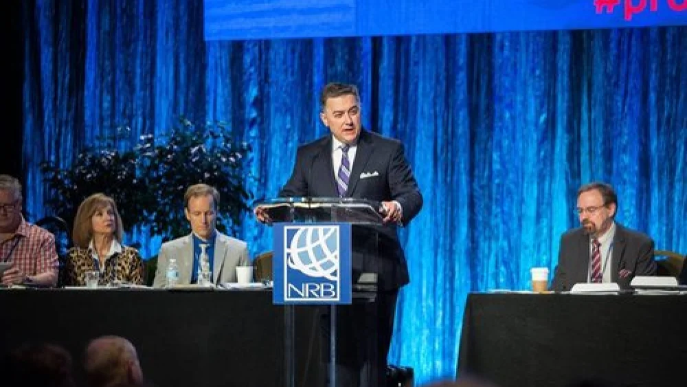 National Religious Broadcasters (NRB) President Dr. Jerry Johnson (at podium) speaks at the organization’s International Christian Media Convention Feb. 27 in Orlando, Fla. Johnson said that the “DNA of NRB is pro-Israel, because it is a biblical DNA.” Credit: NRB via Facebook.