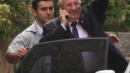 Click photo to download. Caption: Israeli president-elect Reuven Rivlin seen leaving his home in Jerusalem on June 11, a day after winning a vote for president held in the Israeli Knesset. Credit: Flash90.