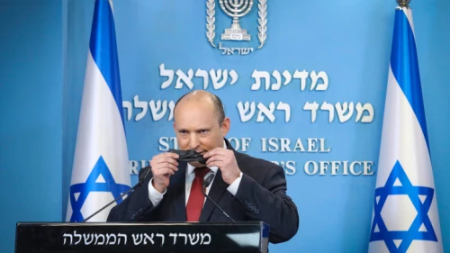Israeli Prime Minister Naftali Bennett holds a press conference at the Prime Minister's Office in Jerusalem to talk about the "fifth wave" of the COVID-19 pandemic. Dec. 19, 2021. Photo by Marc Israel Sellem/POOL.