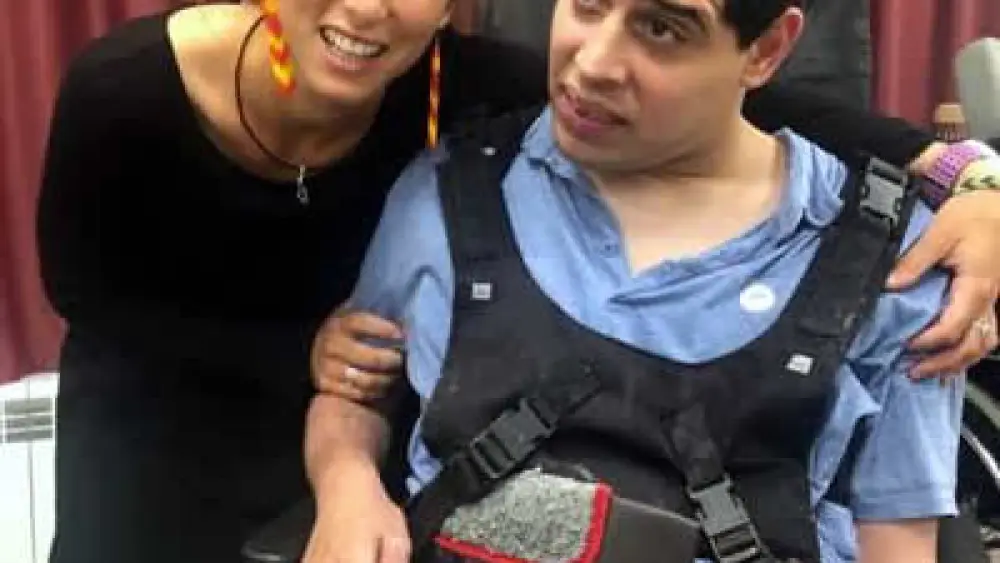 Ayelet Mor with a resident at ALEH. Credit: Courtesy.