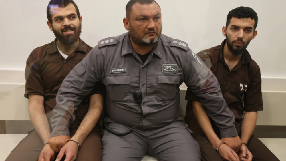 Assad Yosef Assad al-Fara'i and Tzabhi Imad Tzabhi Abu Shakir arrive in court for a hearing, in Lod, on June 9, 2022. Photo by Flash90.