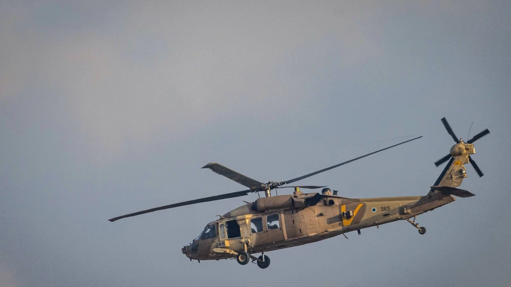 A IAF helicopter flies near the border with the Gaza Strip, Nov. 1, 2023. Photo by Chaim Goldberg/Flash90.