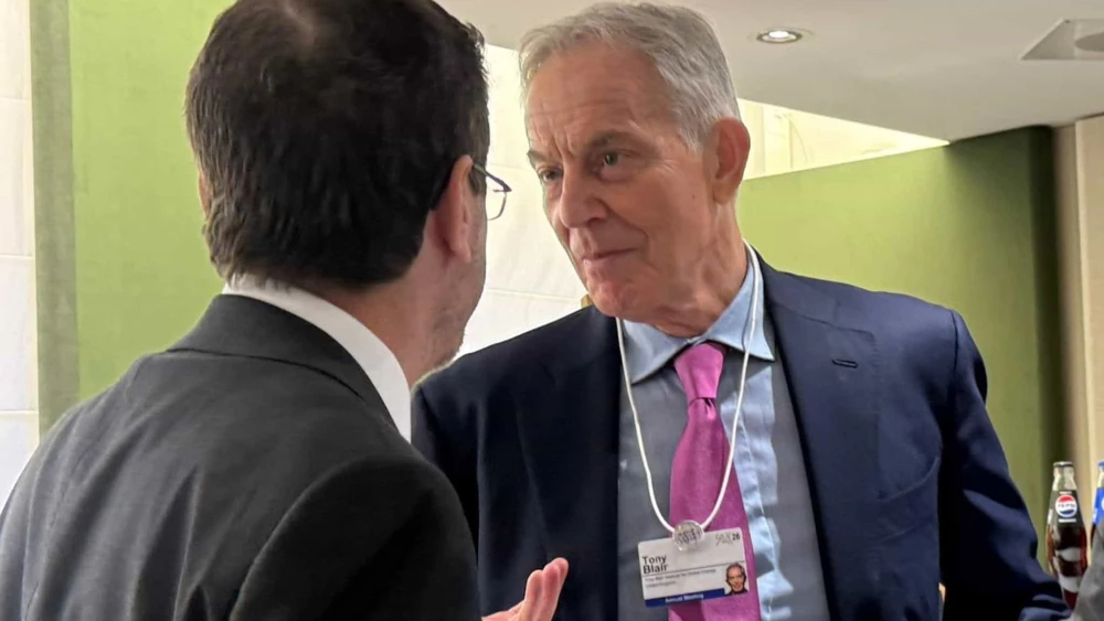 Israeli President Isaac Herzog talks with former U.K. Prime Minister Tony Blair, Davos, Switzerland, Jan. 21, 2026. Credit: Kobi Gideon/GPO.