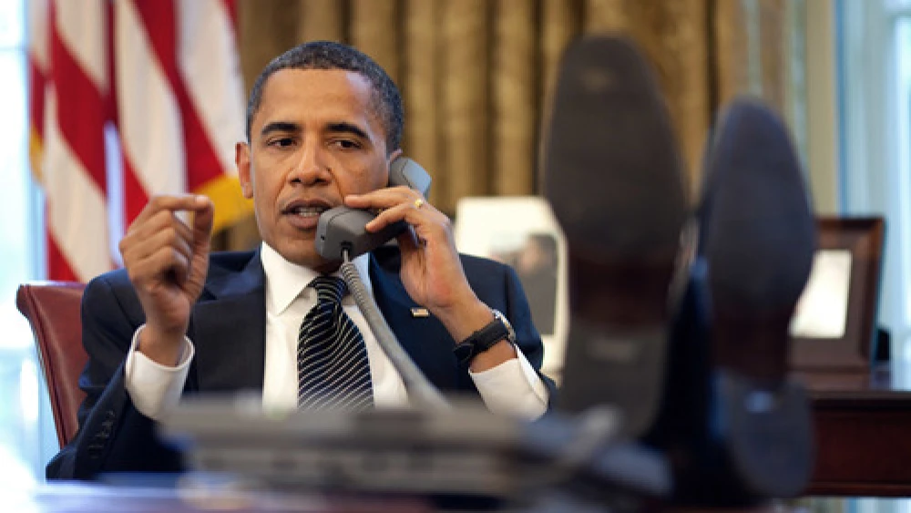 U.S. President Barack Obama speaks on the phone to Israeli Prime Minister Benjamin Netanyahu on June 8, 2009. Credit: Pete Souza/White House.