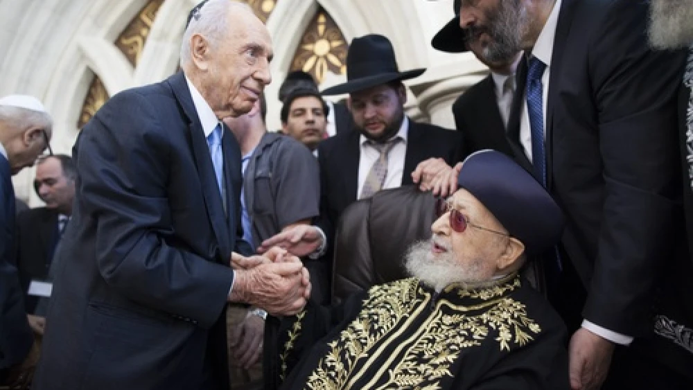 Click photo to download. Caption: Shas spiritual leader Rabbi Ovadia Yosef shakes hands with Israeli President Shimon Peres at a Sept. 16 ceremony at the Rabban Yohanan Ben Zakai Synagogue in Jerusalem during which his son, Rabbi Yitzhak Yosef, officially became the Sephardi Chief Rabbi of Israel. Photo by Yonatan Sindel/Flash90.