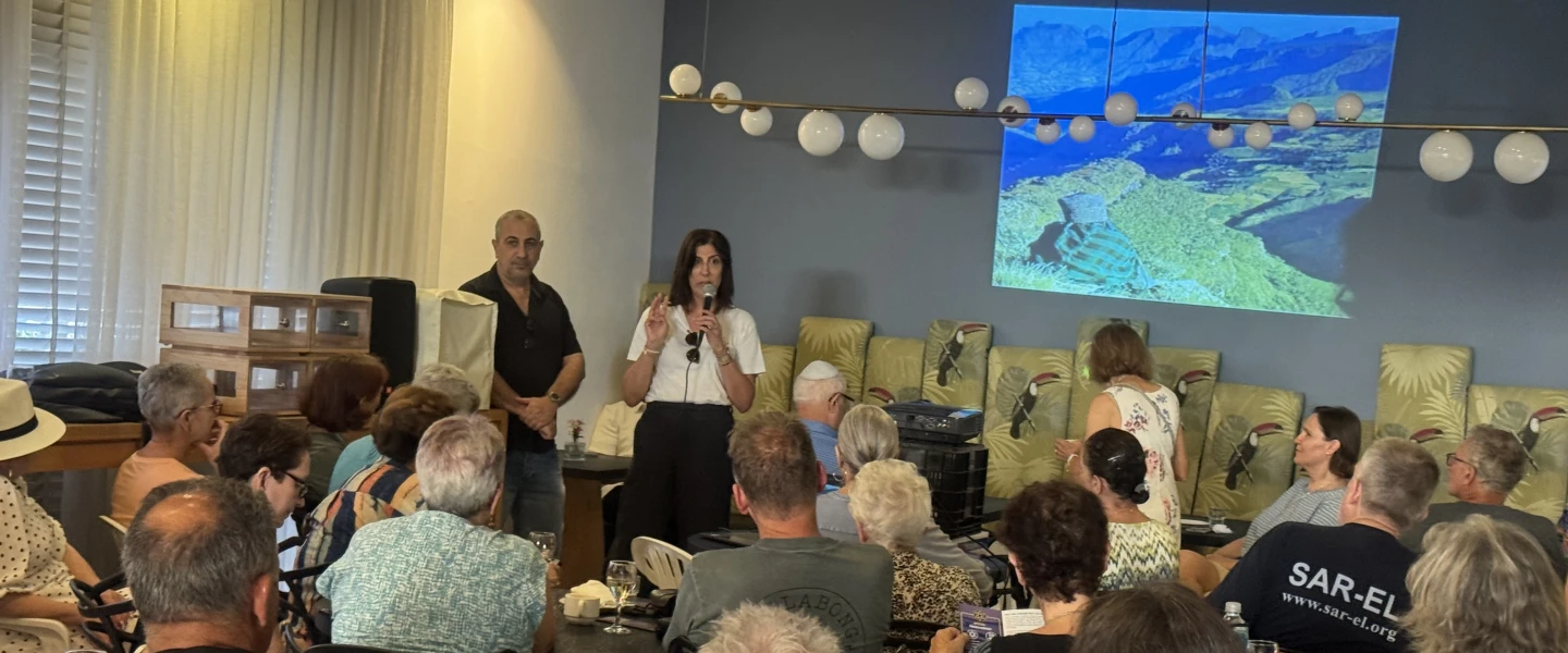 Keren Dahan, CEO of Sar-El, addresses volunteers at an Academy by Sar-El event in Tel Aviv on July 16, 2026. Photo by Howard Blas.