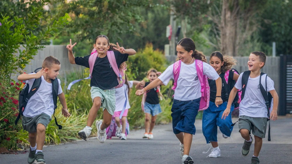 Israeli children who will begin school and kindergarten in the upcoming academic year pose for a picture in Moshav Yashresh, Aug. 27, 2026. The new school year will begin on September 1. Photo by Yossi Aloni/Flash90.