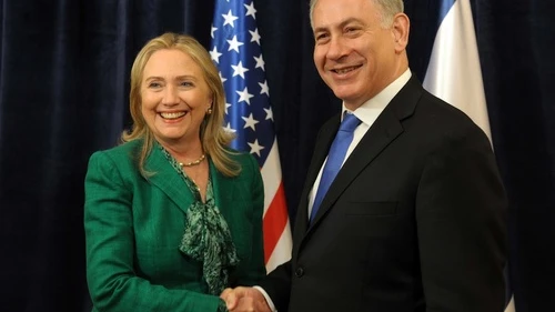 U.S. Secretary of State Hillary Clinton laughs as she meets with Israeli Prime Minister Benjamin Netanyahu (R) during an offsite bilateral meeting as part of the 67th United Nations General Assembly in New York, September 27, 2012. Credit: Avi Ohayon/GPO/Flash90.