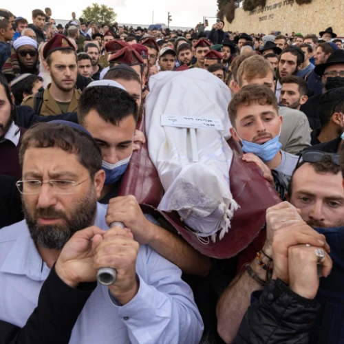 Friends and family attend the funeral of Eliyahu Kay, a 25-year-old immigrant from South Africa who was killed in a terror attack in Jerusalem's Old City, at Har HaMenuchot Cemetery in Jerusalem on Nov. 22, 2021. Photo by Olivier Fitoussi/Flash90.