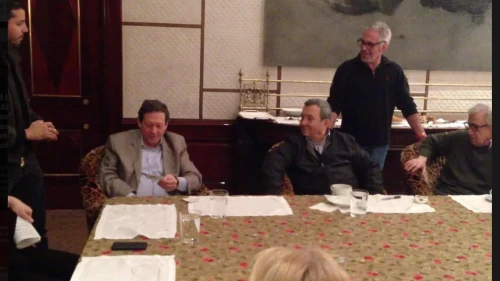 From left, seated: billionaire Thomas Pritzker, former Israeli Prime Minister Ehud Barak and filmmaker Woody Allen; magician David Blaine stands at left, while the late financier Jeffrey Epstein stands between Barak and Allen, in an undated photo from Epstein’s estate released on Dec. 18, 2025. Source: House Oversight Democrats.