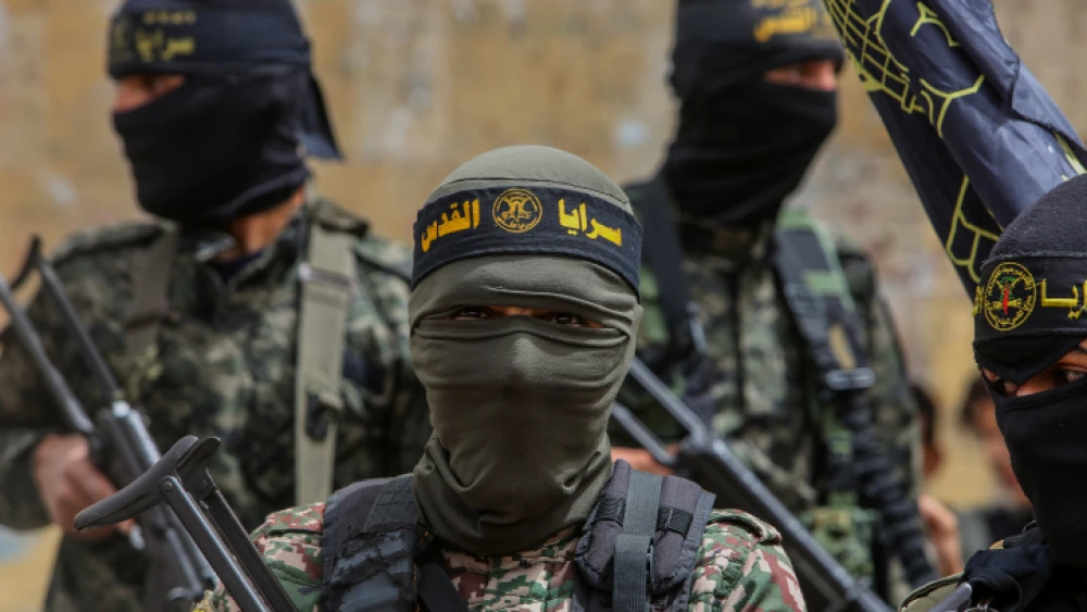 Hamas and Islamic Jihad supporters participate in a rally in the southern Gaza Strip to celebrate a deadly terrorist attack in Tel Aviv, April 8, 2022. Photo by Attia Muhammed/Flash90.