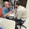 Dr. Yishay Falick examines Arif Hajiyev's cornea transplant at Misgav Ladach hospital in Jerusalem. Credit: Courtesy