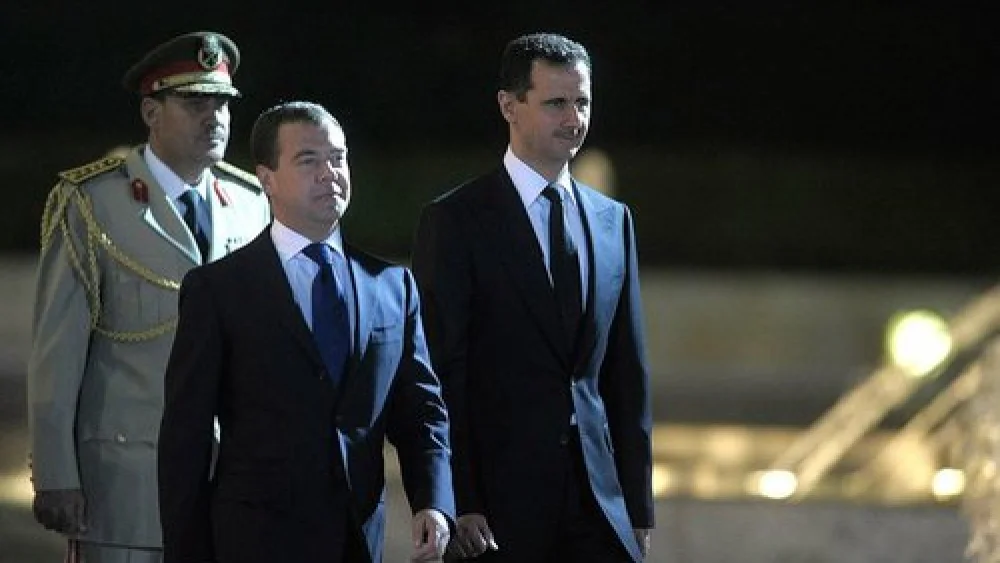 Syrian President Bashar Assad (right) with Russian Prime Minister Dmitriy Medvedev. Credit: Presidential Press and Information Office.