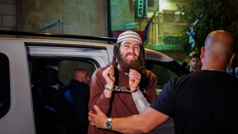 Homicide suspect Elisha Yered arrives for a hearing at the Jerusalem Magistrate's Court, Aug. 5, 2023. Photo by Chaim Goldberg/Flash90.