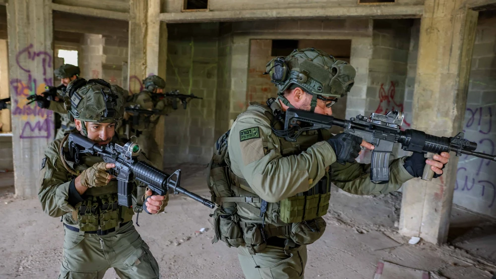 Reservists from the IDF's Devorah Unit drill near the Lebanese border, Jan. 16, 2024. Photo by David Cohen/Flash90.