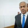 Former Israeli prime minister Benjamin Netanyahu arrives at the District Court in Jerusalem for a hearing on May 31, 2022. Photo by Yonatan Sindel/Flash90.