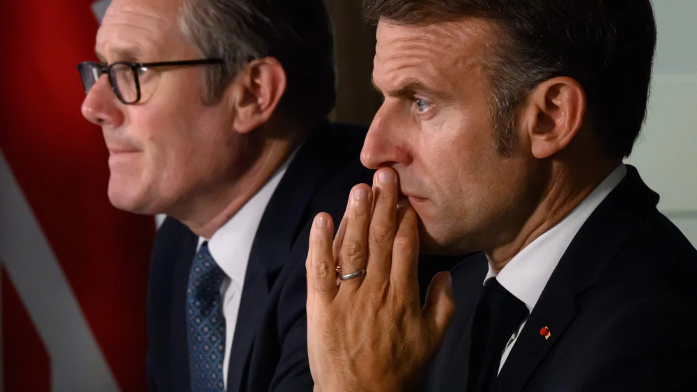 British Prime Minister Keir Starmer and French President Emmanuel Macron host a meeting of the Coalition of the Willing during a joint military visit to the Northwood Headquarters in London, July 10, 2025. Photo by Leon Neal/Getty Images.