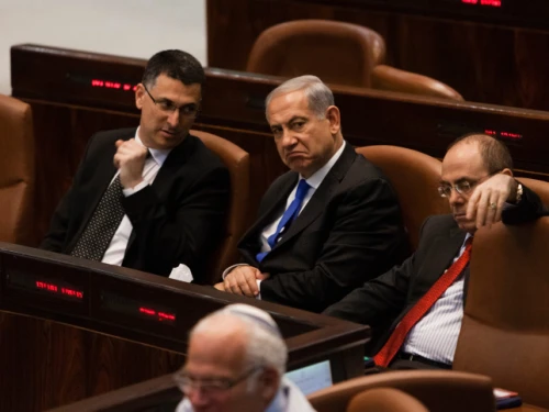 From left, Interior Minister Gideon Sa'ar, Prime Minister Benjamin Netanyahu and Regional Development Minister Silvan Shalom attend a special Knesset session in Jerusalem on July 9, 2013. Credit: Flash90.