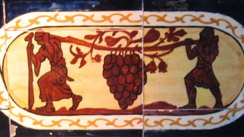 A mosaic depicting the biblical Israelite spies returning with grapes from Canaan. Credit: Yair Talmor via Wikimedia Commons.