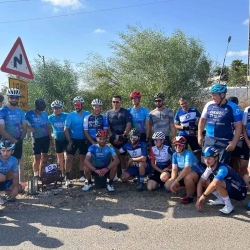 Riders at the memorial set up for Tomer Shpirer near Tzomet Mefalsim, Oct. 5. 2024. Photo: Amelie Botbol.