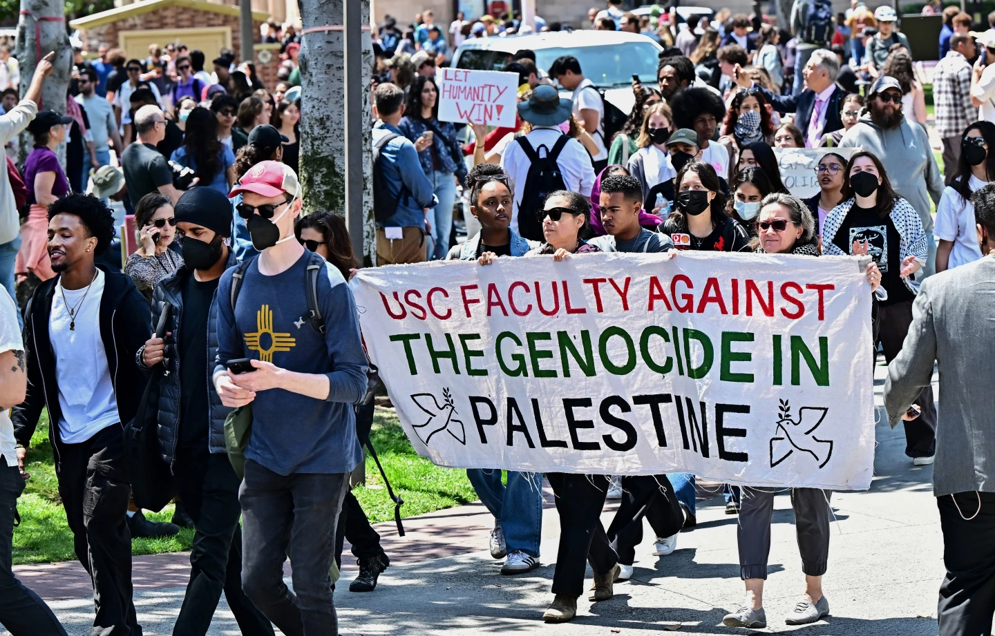 Faculty join pro-Palestinian students as they protest the Israel-Hamas war on the campus of the University of Southern California in Los Angeles, on April 24, 2024. Photo by Frederic J. Brown/AFP via Getty Images.