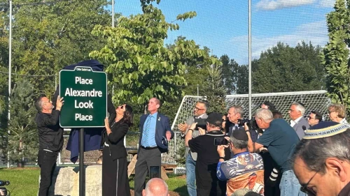 Alain and Raquel Ohnona Look uncover the plaque bearing the name of their son Alex, murdered by Hamas on Oct. 7, 2023, in Montreal, Canada. Photo: Amelie Botbol.