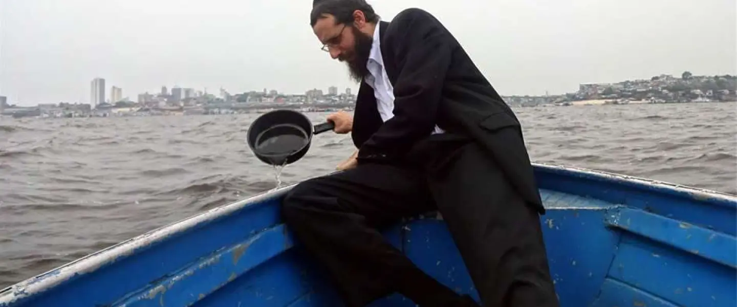When Rabbi Arieh Raichman was growing up in Texas, he never imagined that he would be koshering pots and pans in Brazil's Amazon River. Credit: Chabad.org/News.