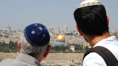 Two Jewish men look at Jerusalem’s Old City, including the Temple Mount, from the Mount of Olives. Credit: Rachael Cerrotti/Flash90.