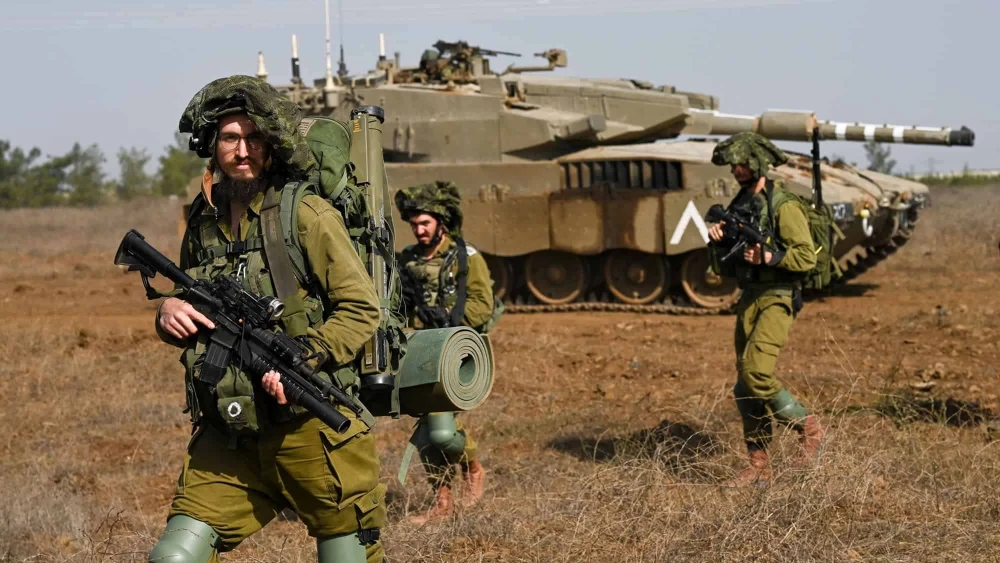 Israel Defense Forces reserve infantry and Merkava tank soldiers train in a military exercise in the Golan Heights on Oct. 23, 2023. Photo by Michael Giladi/Flash90.