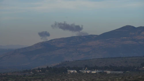 Smoke rises following Hezbollah rocket fire from Lebanon toward Israel's Mount Dov, Dec. 20, 2023. Photo by Ayal Margolini/Flash90.