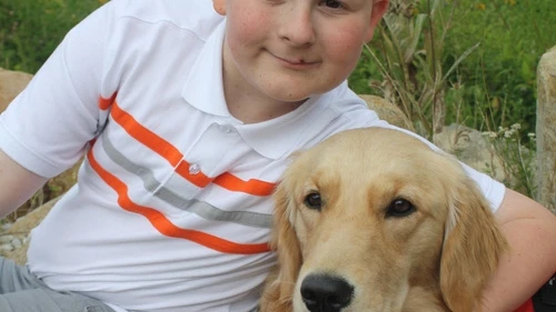 William Snyder and his service dog, Asha. Credit: Courtesy Snyder family.