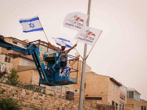 Israeli flags in honor of Independence Day in the Judea city of Efrat, April 5, 2020. Photo by Gershon Elinson/Flash90.