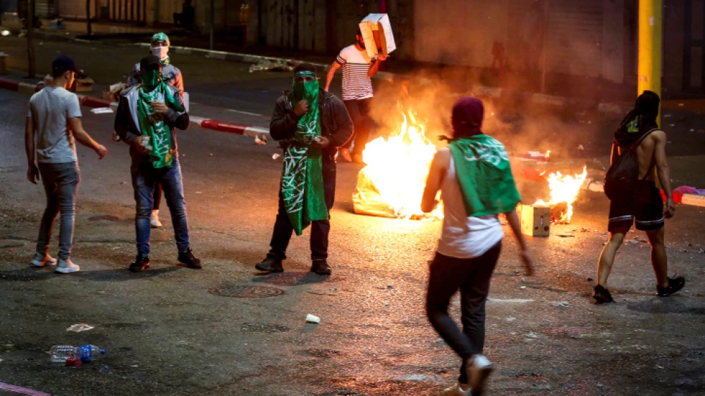 Palestinians demonstrate in Hebron on behalf of the six terrorists who escaped Gilboa Prison in northern Israel, Sept. 8, 2021. Photo by Wisam Hashlamoun/Flash90.